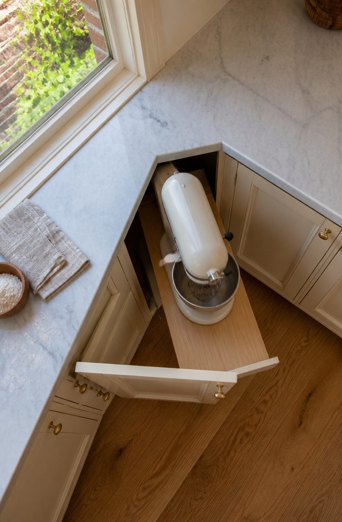 How to Hide Small Kitchen Appliances: 15 Ways 9 Corner cabinet with pull-out trays holding small kitchen appliances